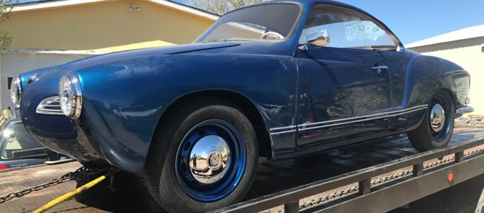 classic car being towed in colorado springs